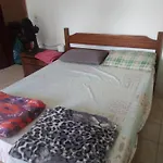 Quarto casal banheiro compartilhado